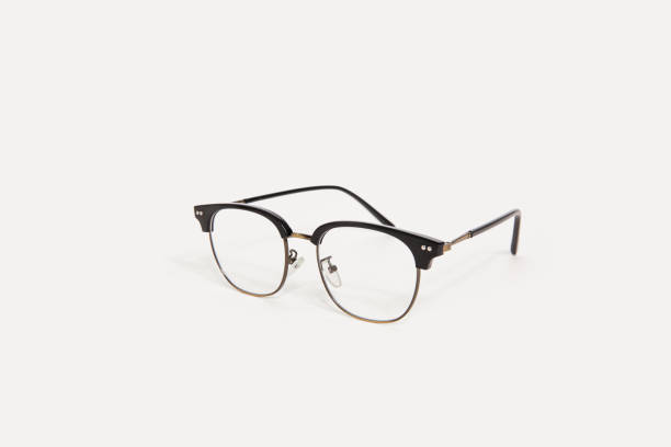 istock Stylish black eyeglasses isolated on white background perspective view 1471141382