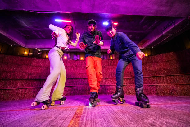 istock Action portrait of roller disco dancers under neon lighting 1471143118