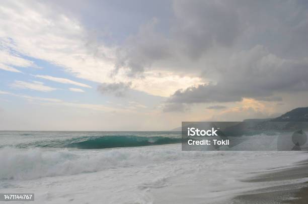 Big Wave On The Ligurian Sea At The Sunset During Summer Stock Photo - Download Image Now