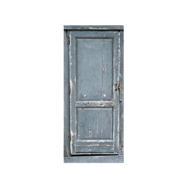 istock Old gray wooden door isolated on white, background texture 1471145736