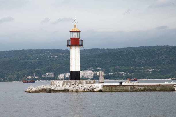 istock White lighthouse tower with red top. Varna, Bulgaria 1471145756