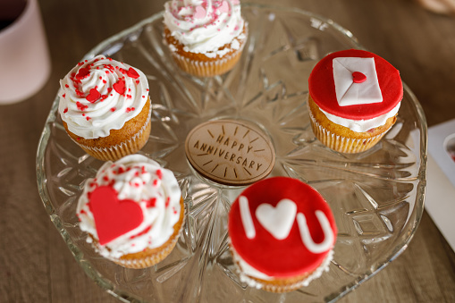 A sweet Valentine's Day treat, cupcakes on a dessert stand.
