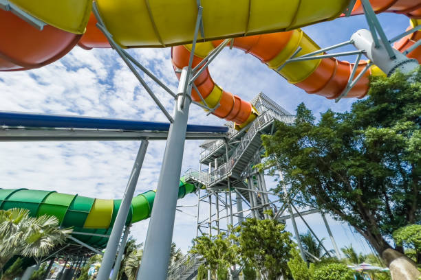 istock Colourful plastic slides in aquapark in the sunlight 1471159938