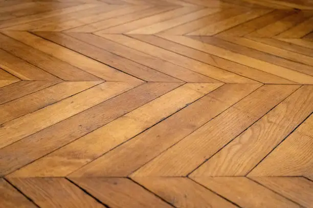 Photo of Chevron wood floor pattern