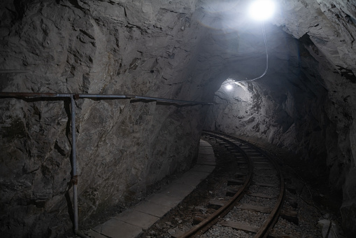 Abandoned railway in mine tunnel