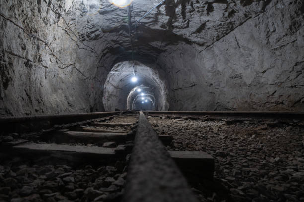 istock Abandoned railway in mine tunnel 1471175349