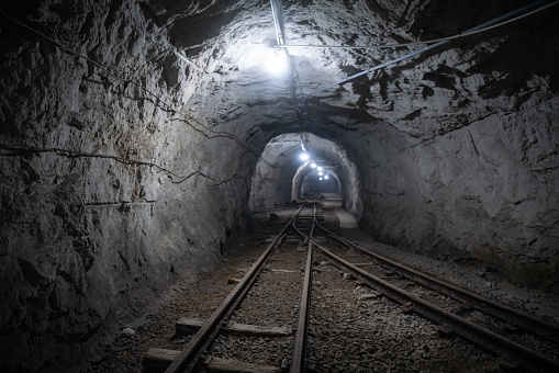 Abandoned railway in mine tunnel