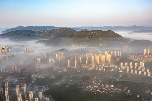 Aerial photography morning fog of urban construction in Putian City, Fujian Province