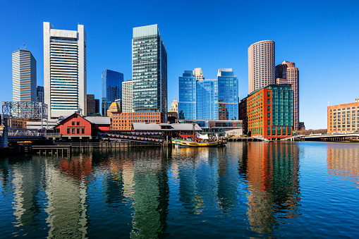 View from the Seaport District towards downtown Boston waterfront skyline and its business and financial district.