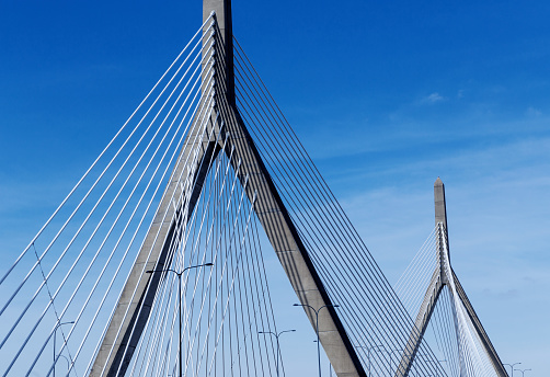 Leonard P. Zakim Bunker Hill Memorial Bridge (also known as The Zakim) is a cable-stayed bridge completed in 2003 across the Charles River in Boston. The bridge is a cable-stayed bridge in a harp configuration with cradles carrying each strand through their pylon.