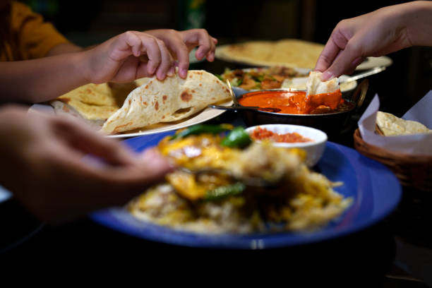 istock Cropped Image Of People Sharing Arabic Food At Table, High Angle View 1471178492