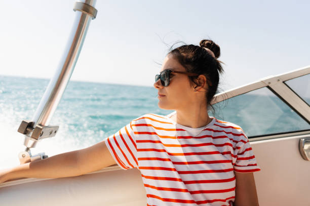 istock Enjoying summer day on the motor boat 1471179861