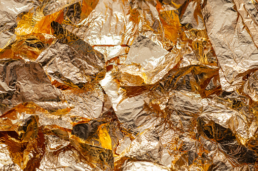 Gold leaf flakes. Luxurious lightweight foil pieces for festive decorations, and any other craftwork.