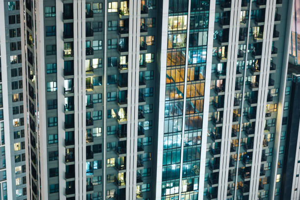 istock Abstract architecture building condominium at night 1471185569