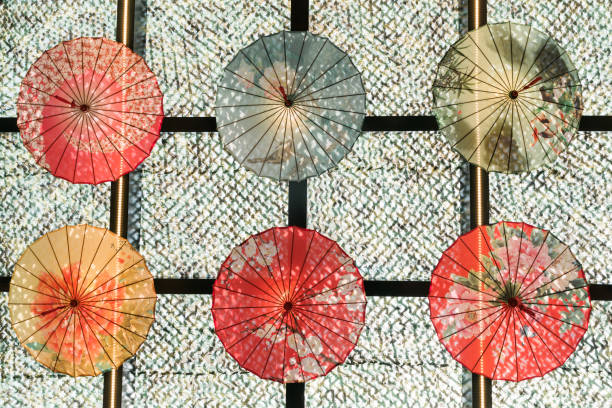 istock Colorful umbrellas decorating glass ceiling 1471185705