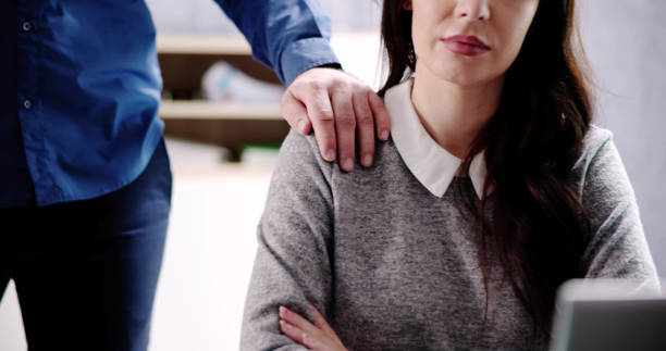 Woman Sexual Harassment In Office. Harassed At Workplace stock photo