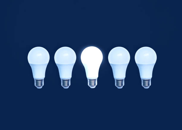 istock one glowing light bulb standing out from the unlit. idea concept with light bulbs and one glowing bulb 1471189397
