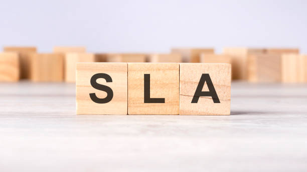 istock SLA - word concept written on wooden cubes or blocks on a light background 1471190016
