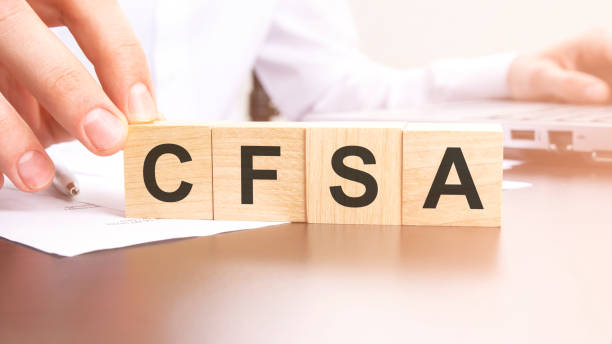 istock man made text CFSA with wood blocks on the background of the office table. selective focus. business concept. 1471190025