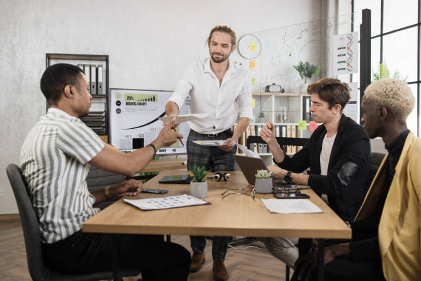 istock Multi ethnic male financiers discussing strategy solution for company development 1471191311