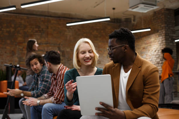 istock Two young employees are sitting. Star-up. 1471191802