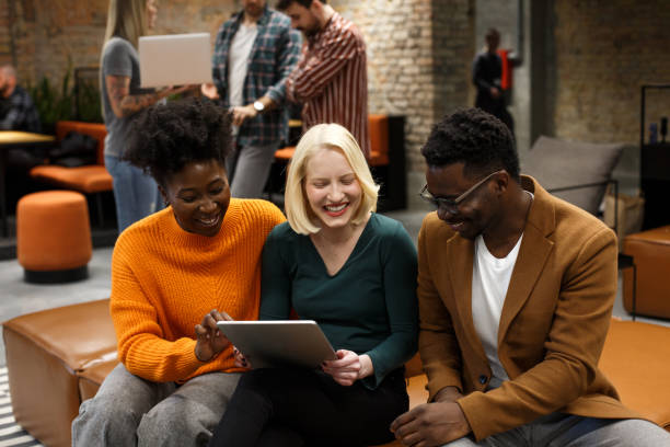 istock Young colleagues are sitting in a shared office space in the start-up company. 1471191815