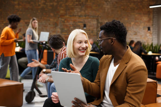 istock Two young employees are sitting. Star-up. 1471191946