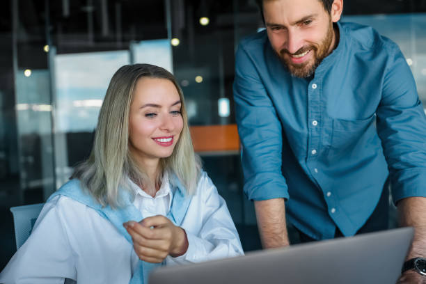istock Coworkers working on a project and looking interested 1471195266