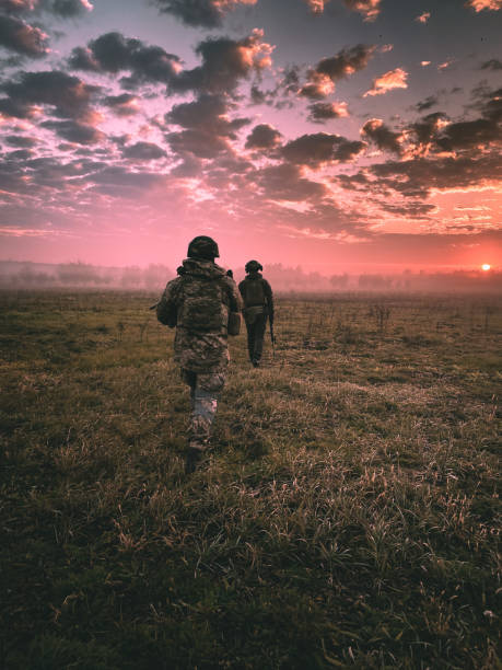 istock Early Morning Patrol: Two Soldiers on a Mission 1471195829