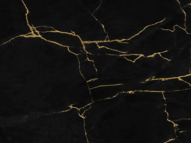 istock Black and gold marble luxury wall texture with shiny golden line pattern abstract background design for a cover book or wallpaper and banner website 1471197245