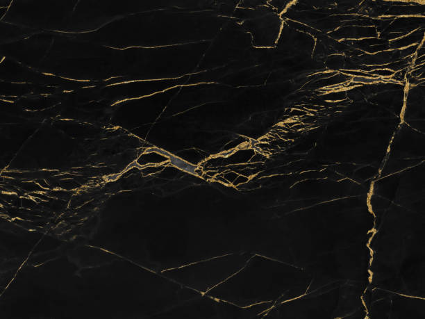 istock Black and gold marble luxury wall texture with shiny golden line pattern abstract background design for a cover book or wallpaper and banner website 1471197271