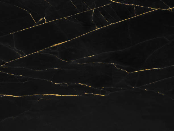 istock Black and gold marble luxury wall texture with shiny golden line pattern abstract background design for a cover book or wallpaper and banner website 1471197297
