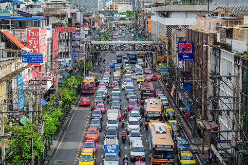 Bangkok, Thailand - Jun 17, 2016. Cars running on street in Bangkok, Thailand. Bangkok is the heart of the country investment and development.
