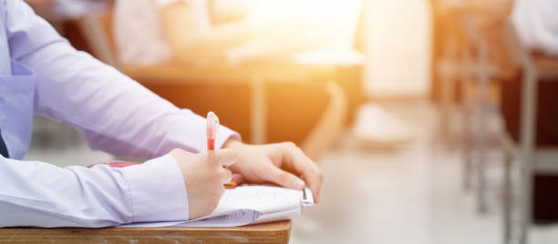 istock Young teen students taking notes while listening to the lecture in the classroom 1471200411