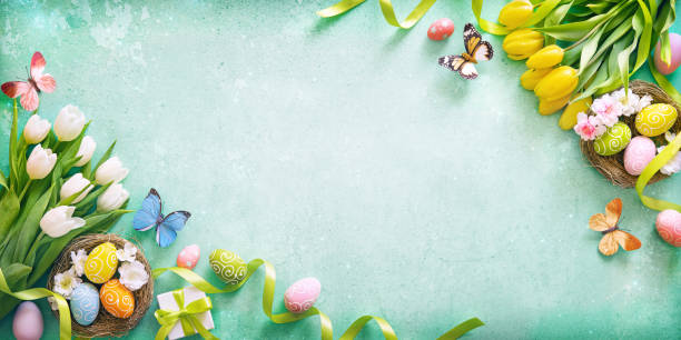 istock Easter background. Colorful spring tulips with butterflies and painted eggs 1471200951