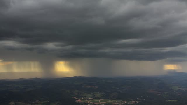 View from stom clouds raining from a mountain close to Belo Horizonte city, Minas Gerais State, Brazi