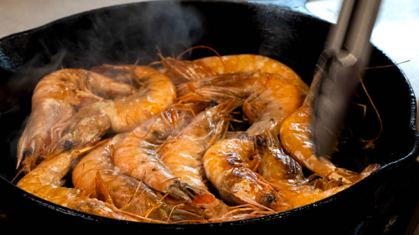istock Whole Prawns Cooking in Cast Iron Pan 1471204297