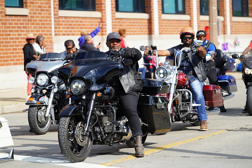 Milwaukee, Wisconsin USA - June 19th, 2021: African American motorcycle gangs participated and rode on motorcycles in Juneteenth celebration parade.