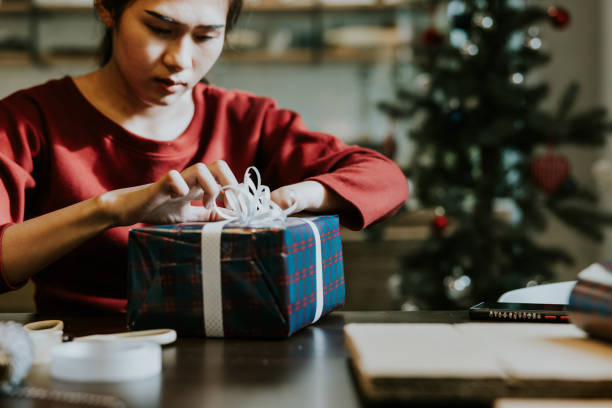 istock Rechecking everything before sending this Christmas gift to my friend. 1471215677