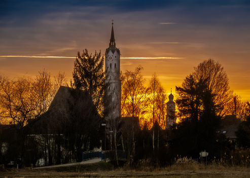 The church of Schrobenhausen and a colorful sky during sunset