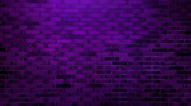 istock abstract purple brick wall texture used as background, brick wall texture for design. empty, old, brick wall background with copy space. product showcase spotlight background with violet neon light. 1471221362