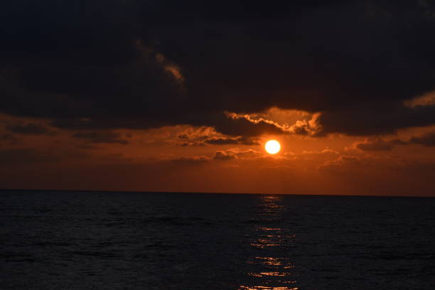 istock orange reflection over the black sea 1471222561