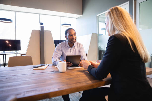 istock Business Associates in Community Office Space 1471225575