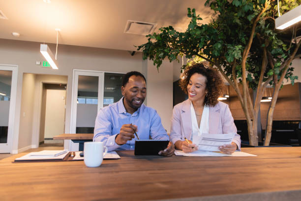 istock Business Associates in Community Office Space 1471225673