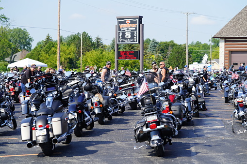 Green bay, Wisconsin / USA - August 23rd, 2020: Many motorcyclist that gathered their motorcycle bikes in front of Vandervest Harley Davidson store for an annual cruise.