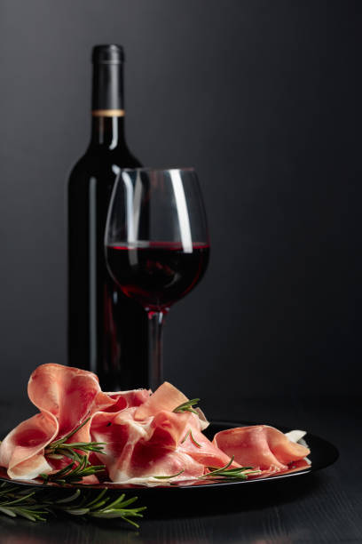 istock Prosciutto with rosemary and red wine. 1471229590