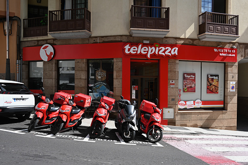 Adeje, Canary Islands, Spain, February 11, 2023 - Fast food restaurant of the Spanish franchise Telepizza located in the center of the municipality of Adeje, located in the southwest of Tenerife.