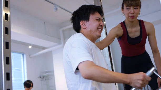 istock Male Amputee Working Out At Gym 1471239160