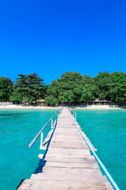 Wooden Pier to the Paradise Island on the Samet Island stock photo