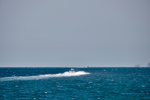Fishing boat waves and on the sea in Turkey.